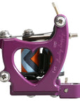 Purple heart tattoo machine with visible branding on a white background