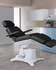 Front view of the Italian-made Lemi Tesera Power Procedure Chair with integrated arm rests.