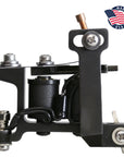 Close-up of a precision tattoo machine with a 'Made in USA' engraving. Features custom-wrapped coils and a polished finish, reflecting traditional American craftsmanship.