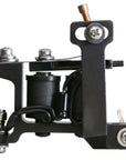 Close-up of a precision tattoo machine with a 'Made in USA' engraving. Features custom-wrapped coils and a polished finish, reflecting traditional American craftsmanship.