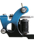 Black and blue fade coil tattoo machine with hinged spring shelf
