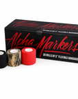Alpha Markers brand box of 20 rolls of 2-inch flexible bandage, shown with three rolls in front: one black, one camouflage, and one red, on a white background.