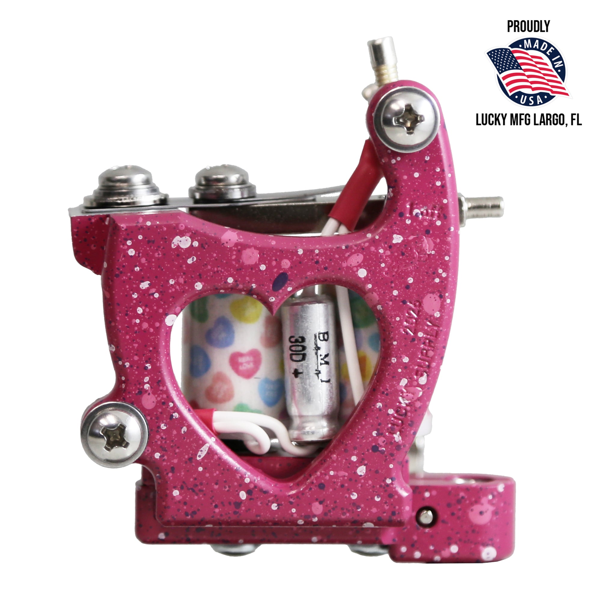 Pink tattoo machine with heart design on a white background, featuring Lucky Mfg branding.
