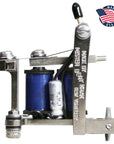 Metal tattoo machine with blue thread spools on a white background, featuring 'Master Craft' branding.