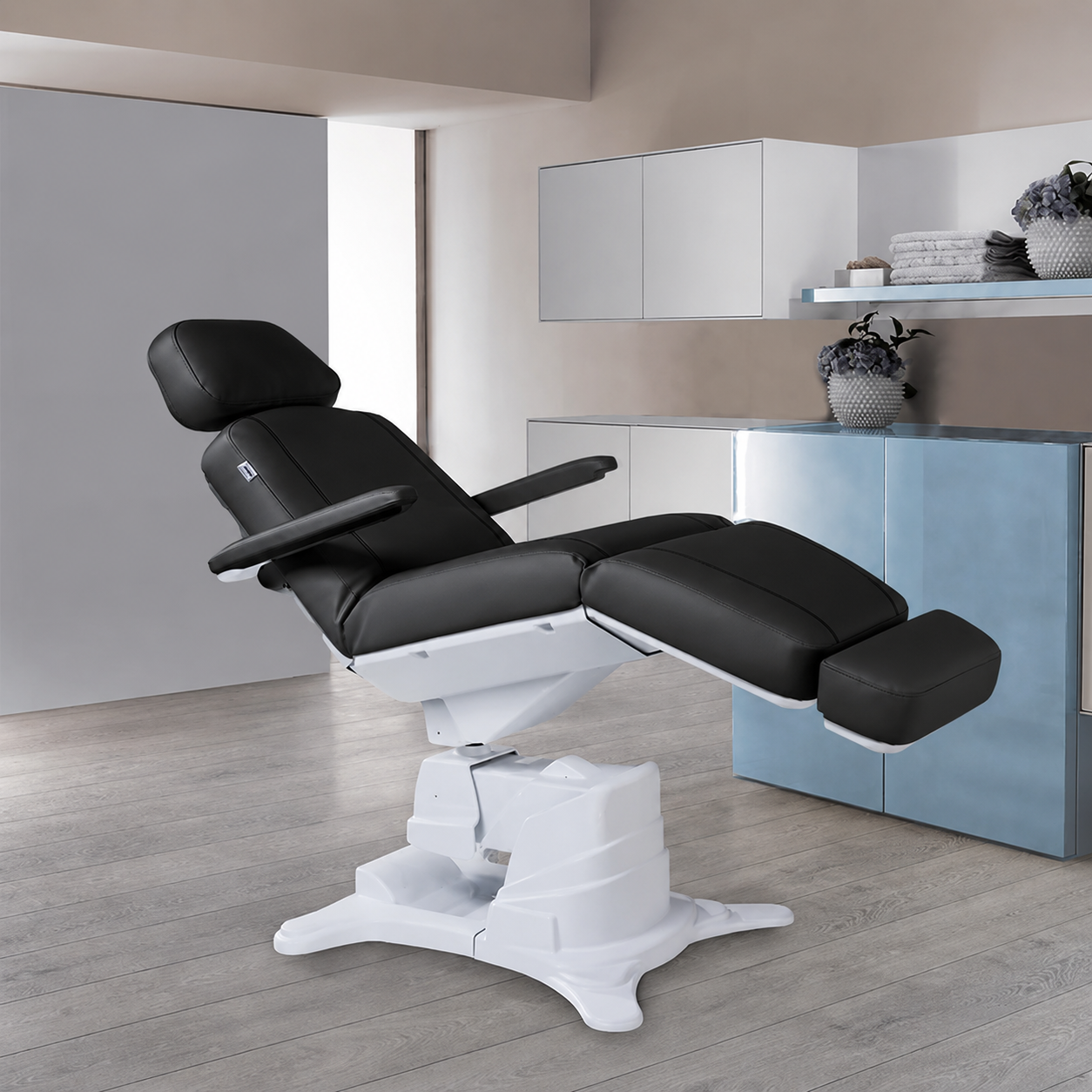 Front view of the Italian-made Lemi Tesera Power Procedure Chair with integrated arm rests.