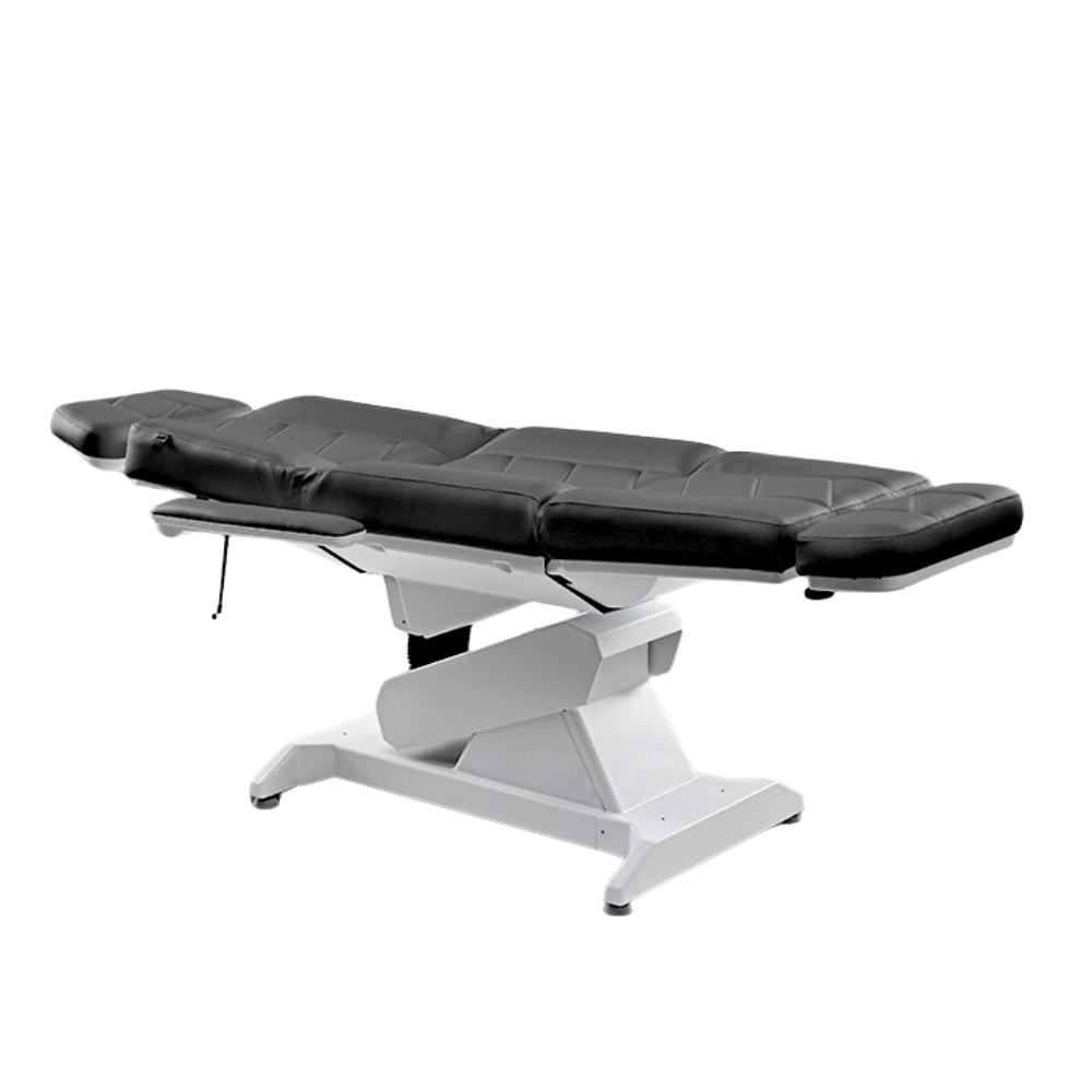 Lemi 4 treatment table fully reclined for tattoo sessions, facials, cosmetic procedures, and medical treatments.