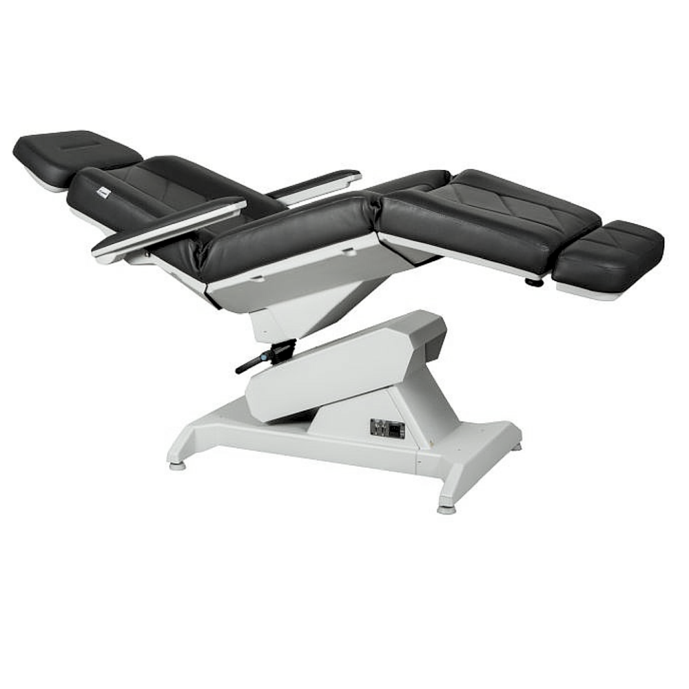 Lemi 4 treatment table fully reclined for tattoo sessions, facials, cosmetic procedures, and medical treatments.