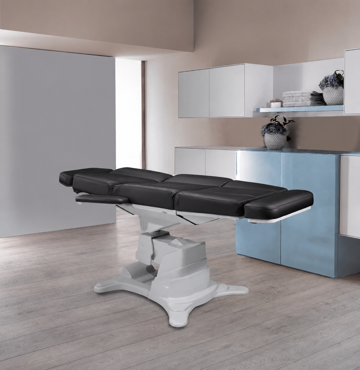 Lemi Tesera Power Procedure Chair fully reclined for tattoo sessions, cosmetic procedures, and medical treatments.