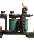 Lucky Supply Drilled Mini Bulldog tattoo machine with green coil wraps