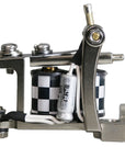 Mini Bulldog liner coil tattoo machine with black-and-white checkerboard coil wrap