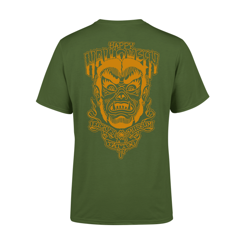 Green t-shirt with a graphic design on the back featuring a face and text.