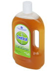 A plastic bottle of Dettol topical antiseptic liquid, with a yellowish tint and label showing the brand name and product description.